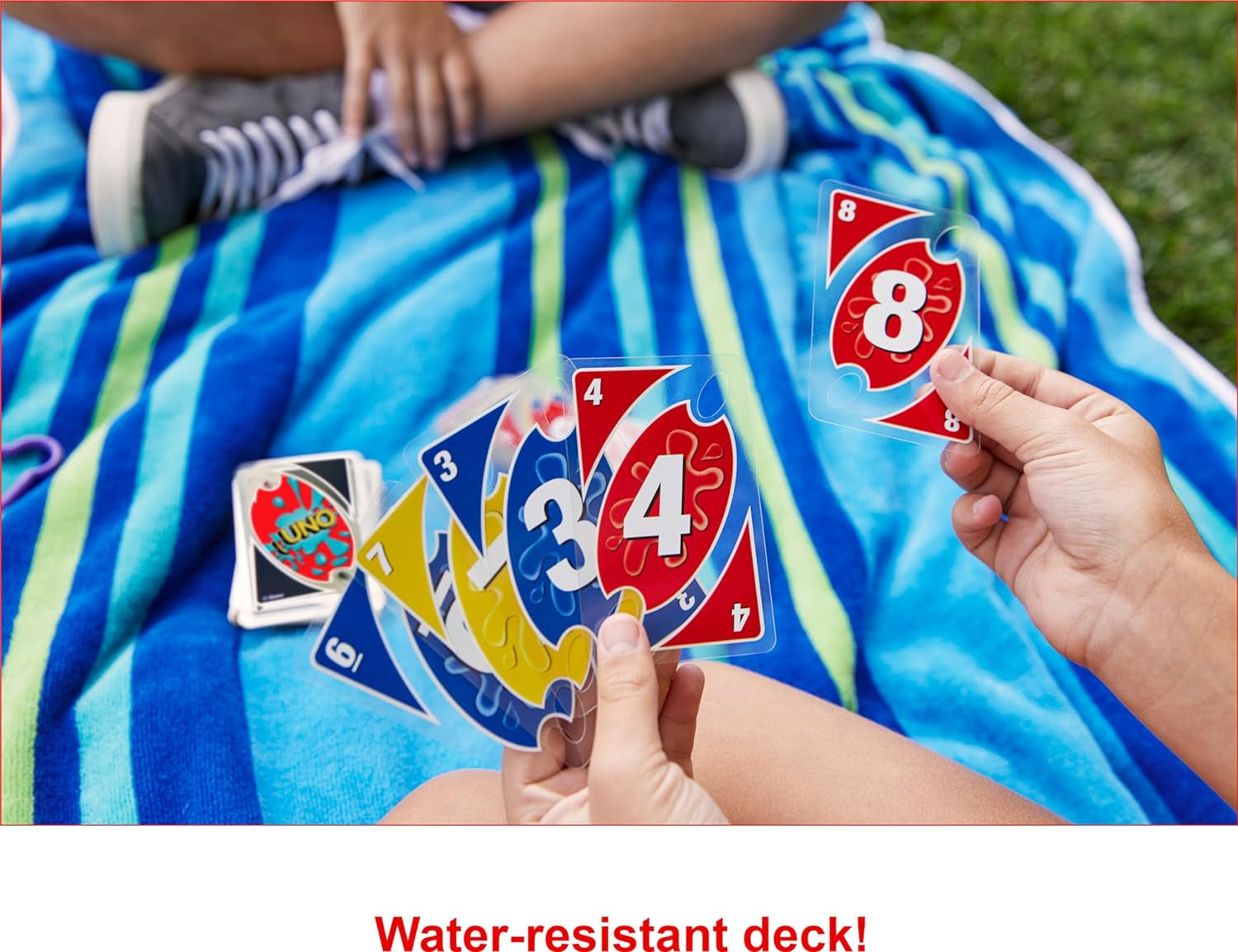 ​UNO Splash Card Game for Outdoor Camping, Travel and Family Night with Water-Resistent Plastic Cards